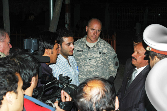Photo by J.D. Hardesty, U.S. Army Corps of Engineers, Afghanistan District – North|U.S. Army Col. Thomas Magness, center, and Kabul Mayor Muhammad Yunus Nawandish, right, describe the solar-powered streetlights project to Afghan reporters on May 19, 2011.