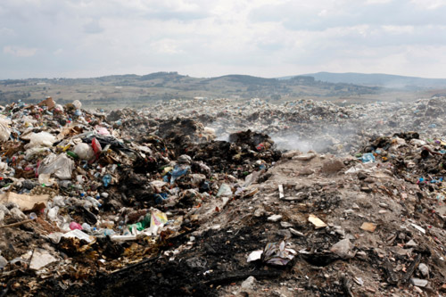 © iStockphoto.com/tolgakolcak|A typical landfill. 