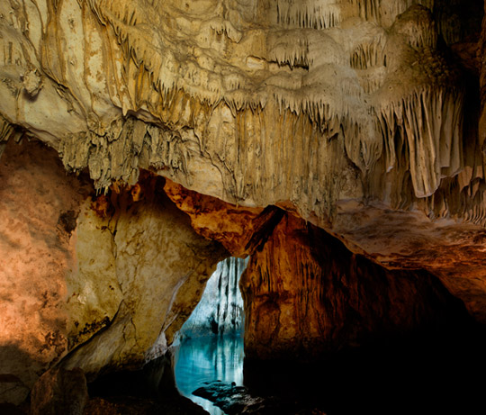 Jack Dykinga|The eons of water shaping the limestone provides tapestries of sculptured ceiling in this un-named cenote.