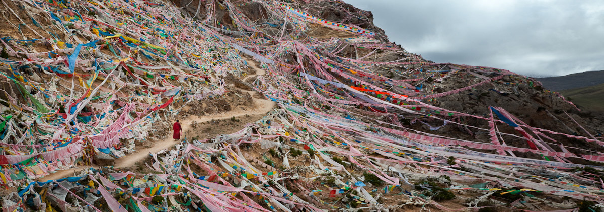 Phil Borges|Prayer flags surrounding the Kora (path) around the Princess Wencheng Temple. Qinghai Province