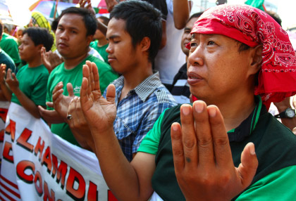 © iStockphoto.com/h3k27 | Filipino Muslims join a peace rally as a peace pact is signed between the Philippine government and secessionist Moro Islamic Liberation Front, the largest Muslim insurgency in Mindanao.