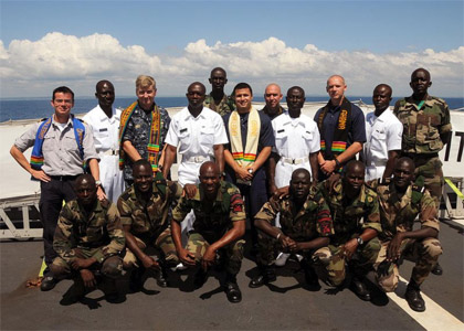 U.S. Navy photo by Chief Mass Communication Specialist Jason Morris|Maritime professionals from Ghana, Senegal and Sierra Leone pose with their maritime law enforcement instructors from the U.S. Navy, U.S. Coast Guard and their Belgian navy interpreter.