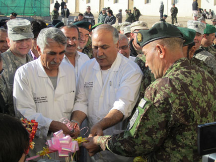 Photo by Joan Kibler, AED-South Afghan and U.S. officials gathered to celebrate the opening of a hospital addition that will serve the Afghan National Army and its nearby community.