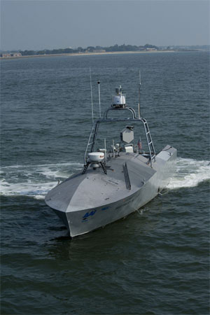 U.S. Navy photo by Mass Communication Specialist Seaman Scott Youngblood | A common unmanned surface vehicle patrols for intruders during Trident Warrior 2011. The experimental boat can operate autonomously or by remote.